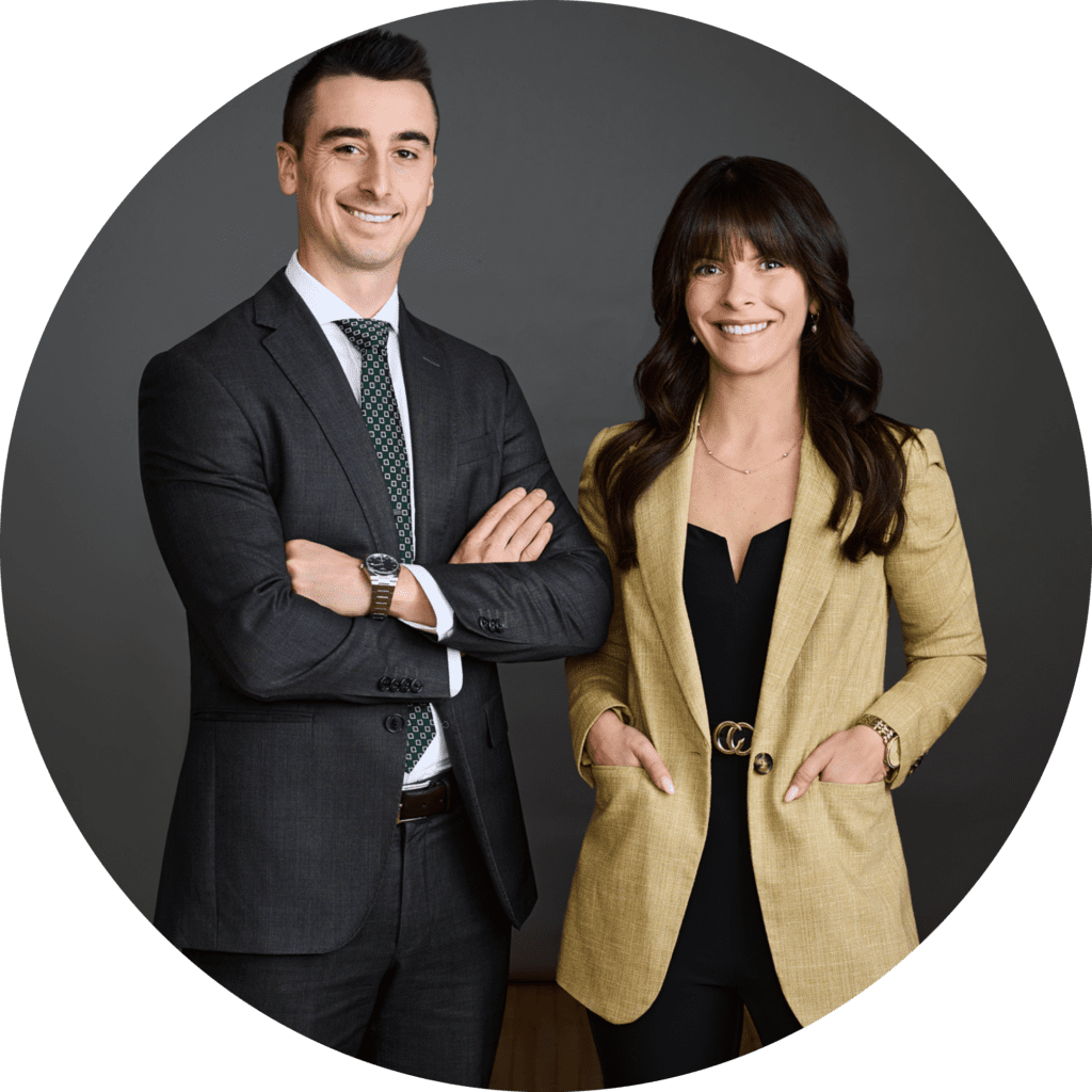 Phil and Lee-Ann D’Astous posing in a photography studio